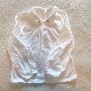 White Peter Pan collar girls top.